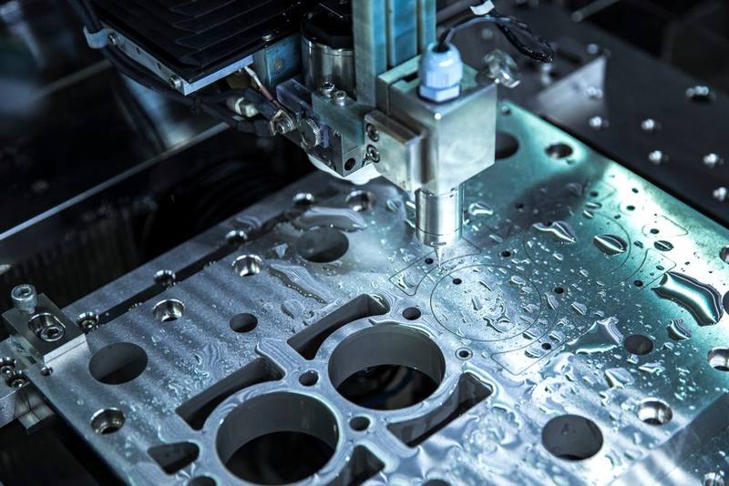 CNC milling with coolant on an aluminium component