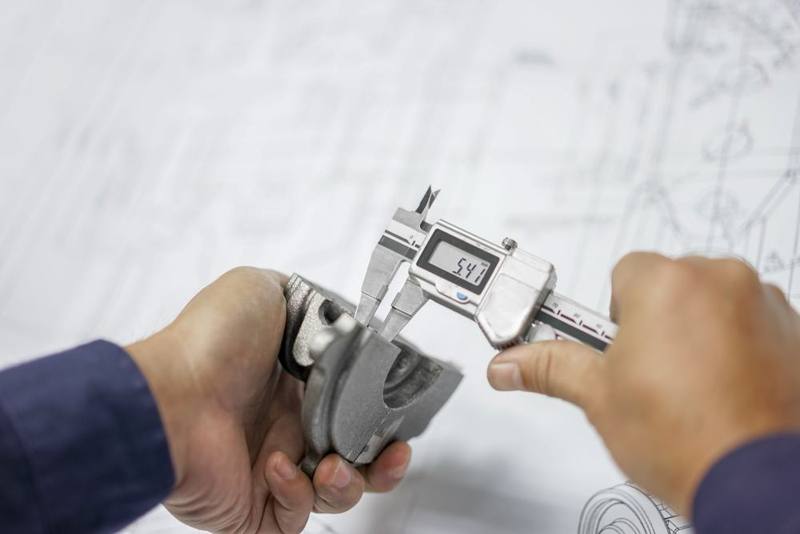 Dimensional inspection of a machined component