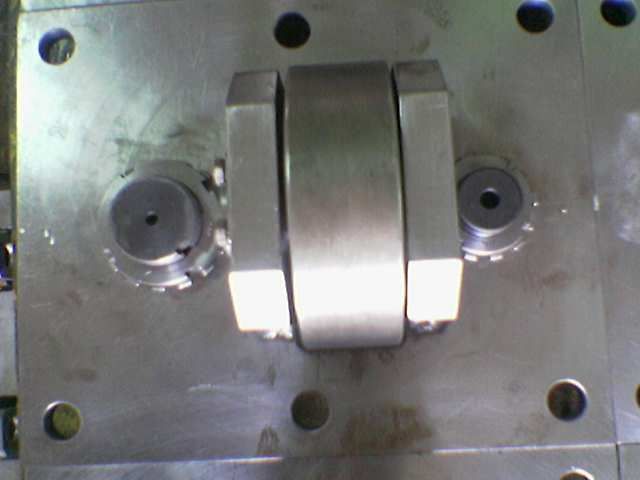 Precision machined component from a cast blank