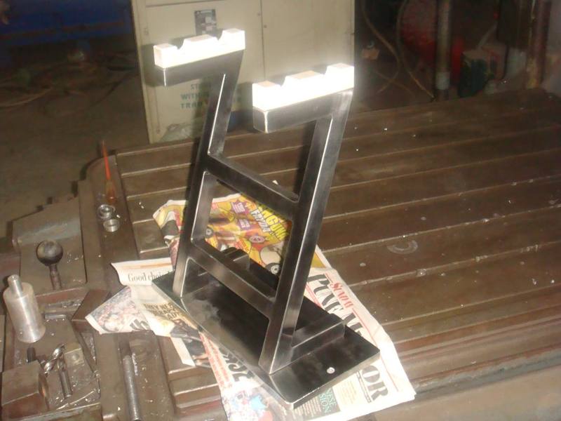 Machined steel stand