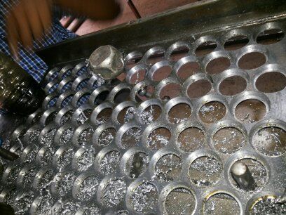 Batch produced pressed components